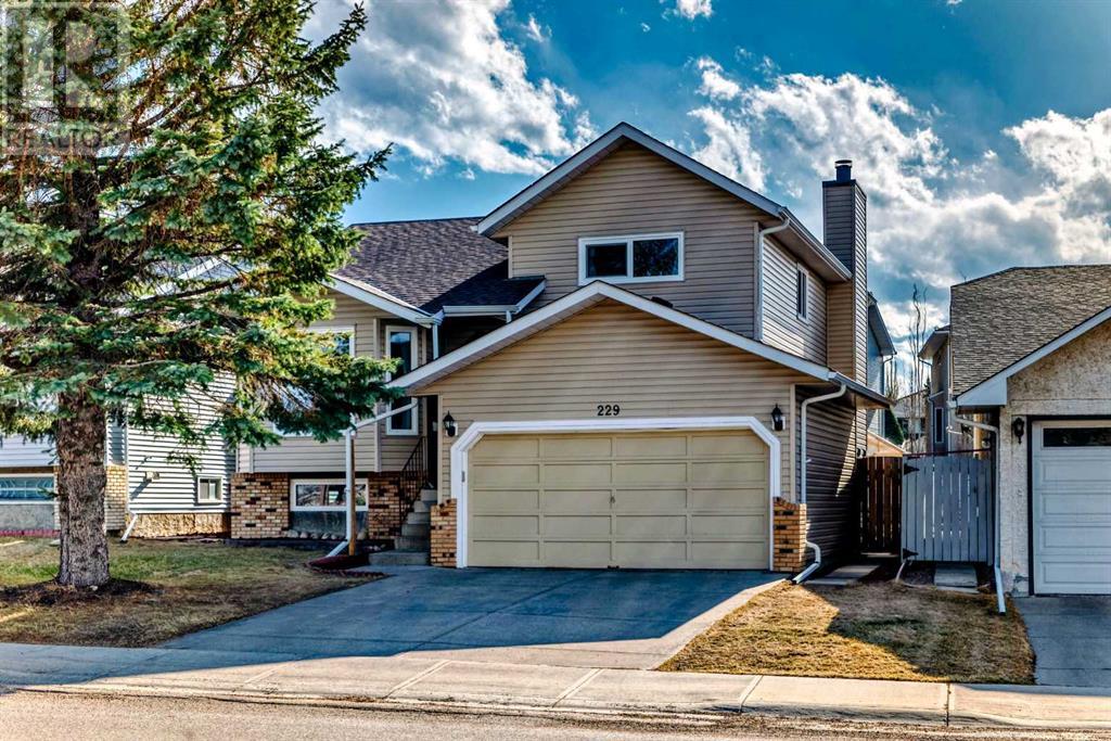 229 Sandarac Drive Nw, Calgary, Alberta  T3K 3W8 - Photo 1 - A2212633