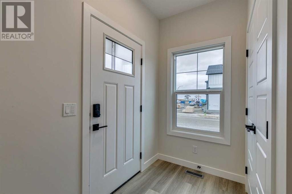Property at 644 Buffaloberry Manor SE image 3