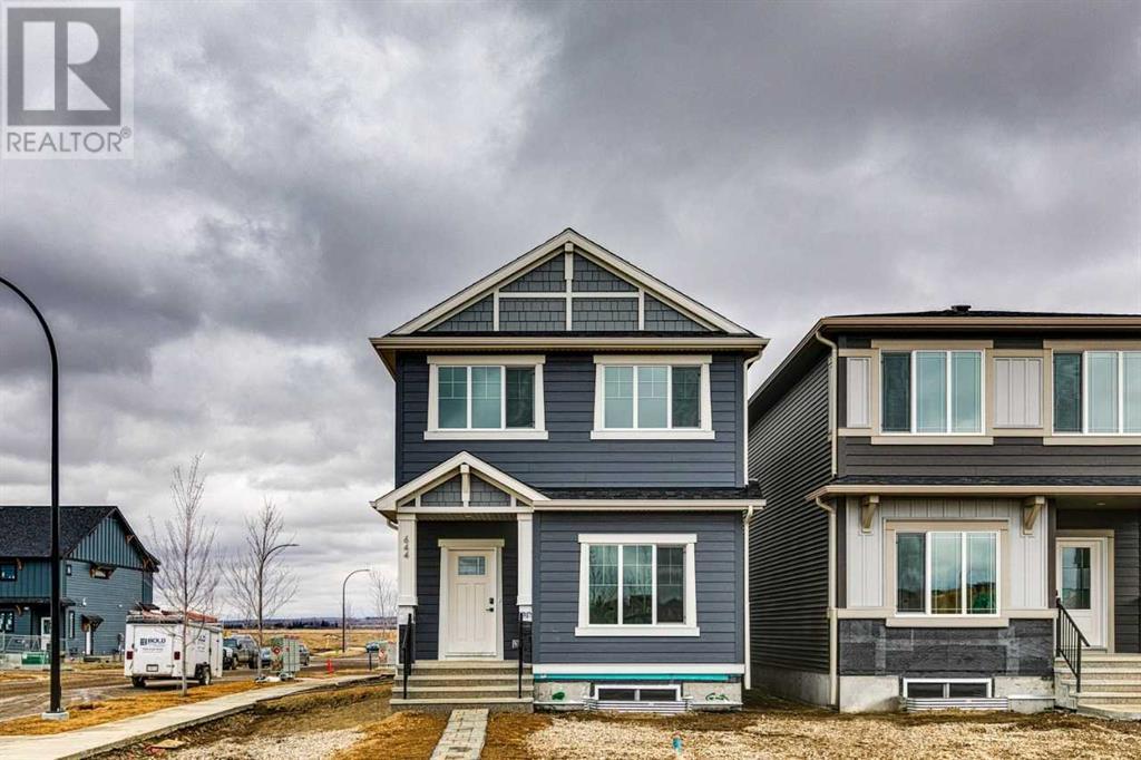 Property at 644 Buffaloberry Manor SE image 1