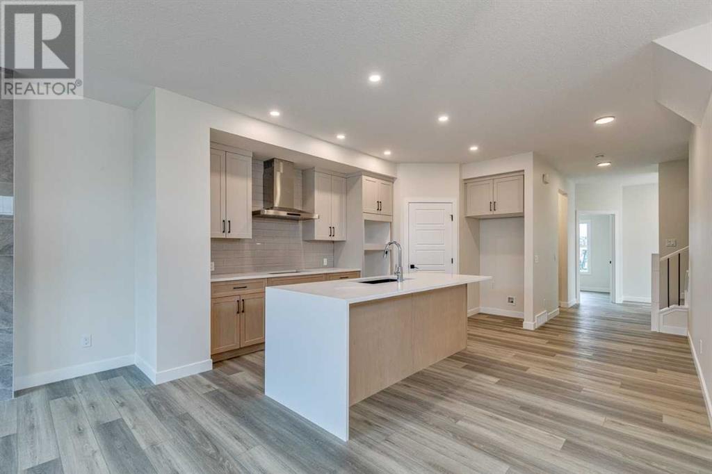 Property at 644 Buffaloberry Manor SE image 5