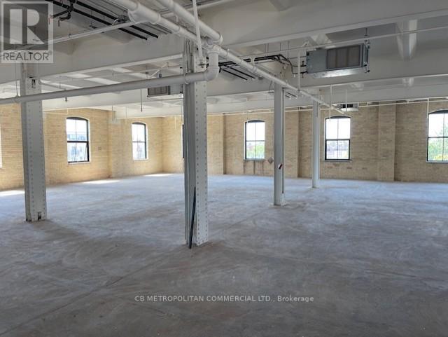 201 - 30 Powerhouse Street, Toronto, Ontario  M6H 0C6 - Photo 3 - W12120569