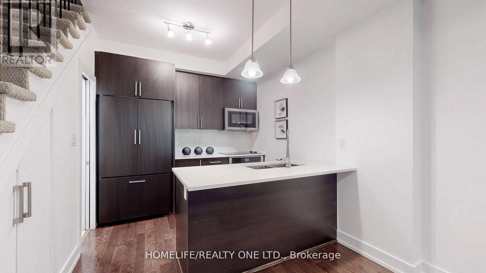 Th 52 - 220 Brandon Avenue, Toronto (Dovercourt-Wallace Emerson-Junction), Ontario  M6H 0C5 - Photo 9 - W12099413