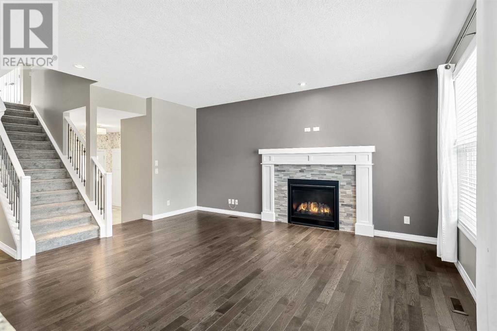 56 Sundown Way, Cochrane, Alberta  T4C 2M4 - Photo 6 - A2216688