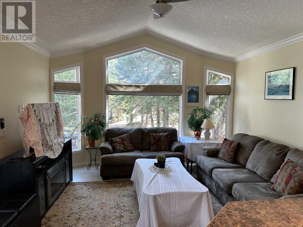 58 Coyote Creek, Rural Mountain View County, Alberta  T0M 1X0 - Photo 10 - A2128863