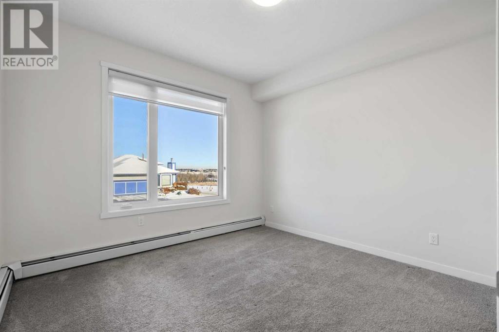 12, 30 Shawnee Common Sw, Calgary, Alberta  T2Y 0R1 - Photo 22 - A2195195