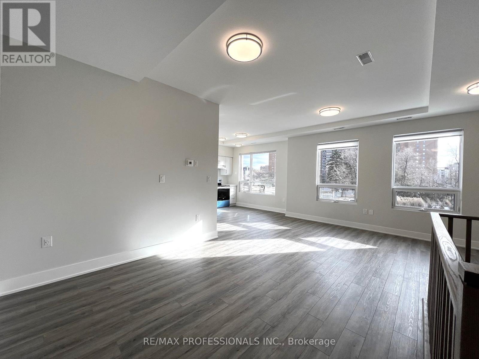 102 - 62 Dixfield Drive, Toronto, Ontario  M9C 3W1 - Photo 4 - W12121655