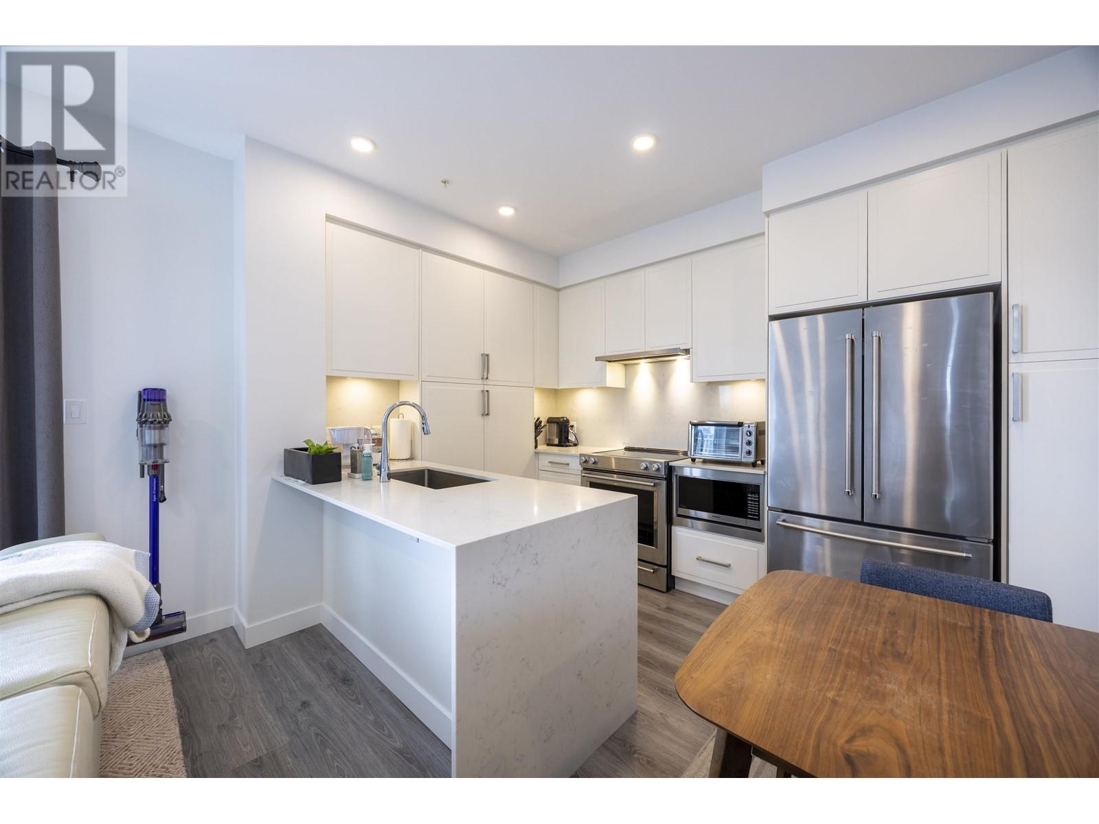 606 700 Clarke Road, Coquitlam, British Columbia  V3J 0K5 - Photo 1 - R2997501