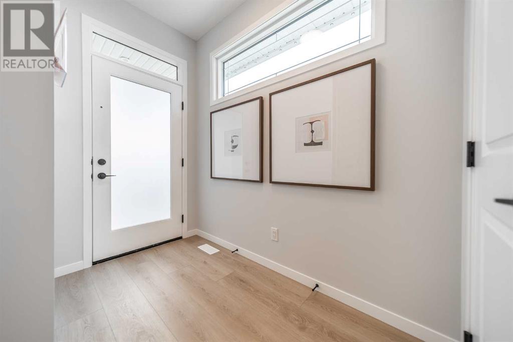 584 Rowmont Boulevard Nw, Calgary, Alberta  T3L 0L6 - Photo 2 - A2213451