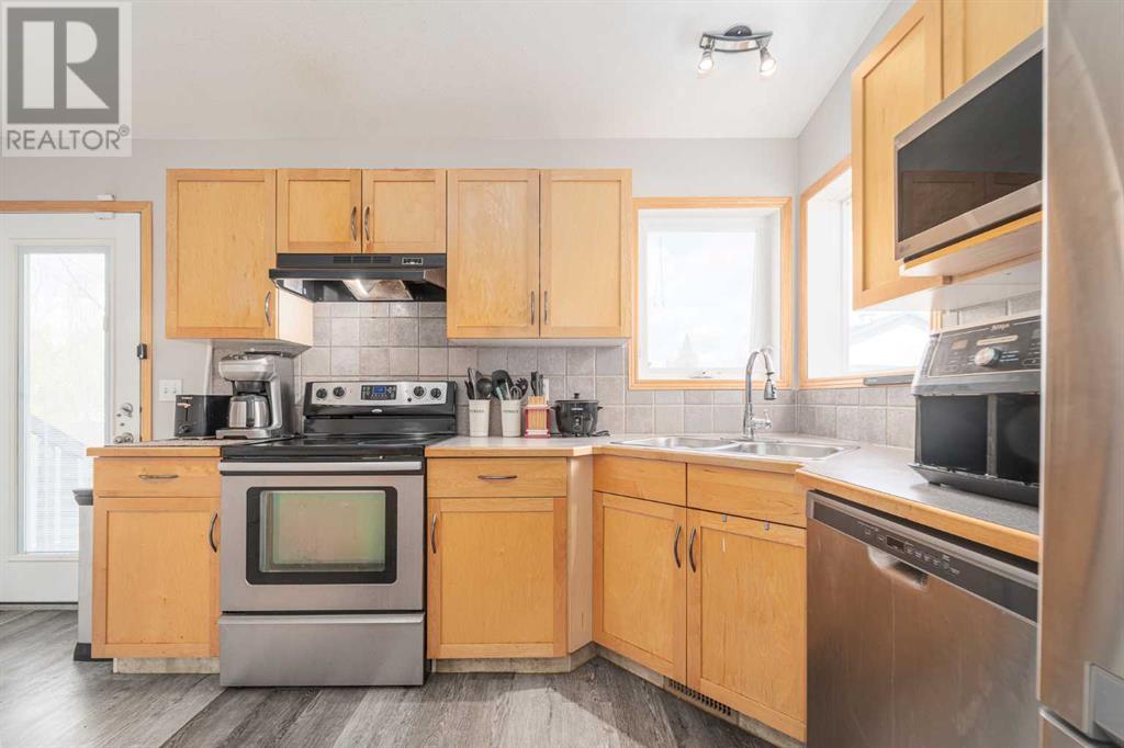 552 Heritage Boulevard W, Lethbridge, Alberta  T1K 7S5 - Photo 5 - A2215431