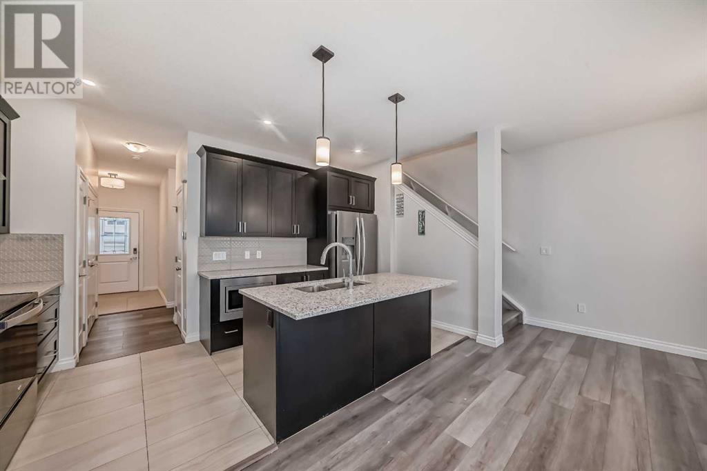 1453 Bayview Point Sw, Airdrie, Alberta  T4B 5K2 - Photo 3 - A2198226