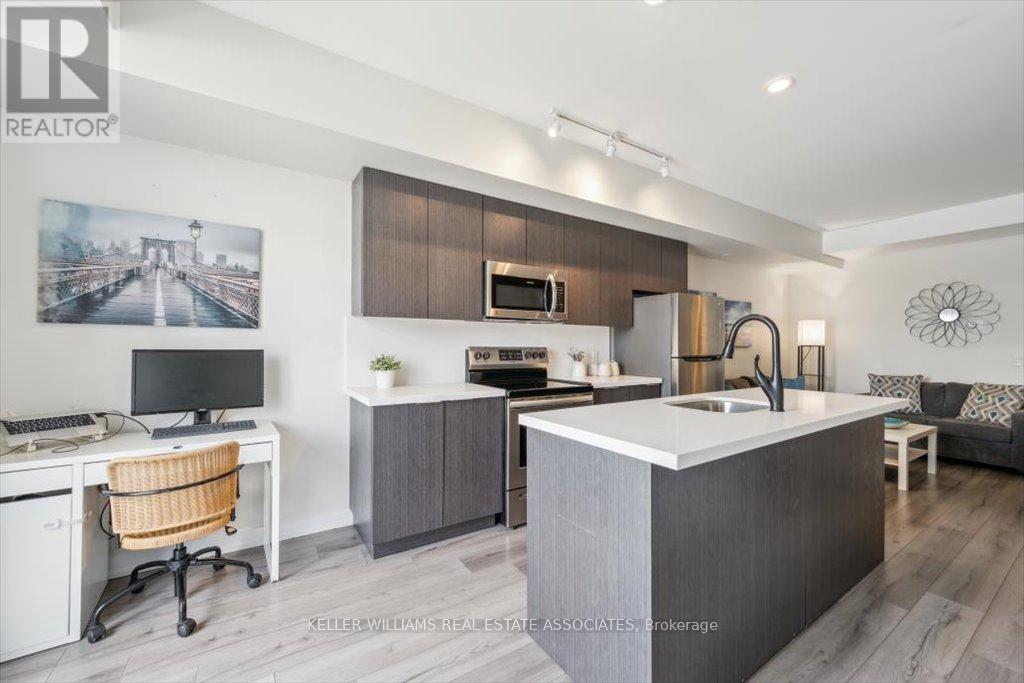 Property at 204 - 3058 SIXTH LINE image 4
