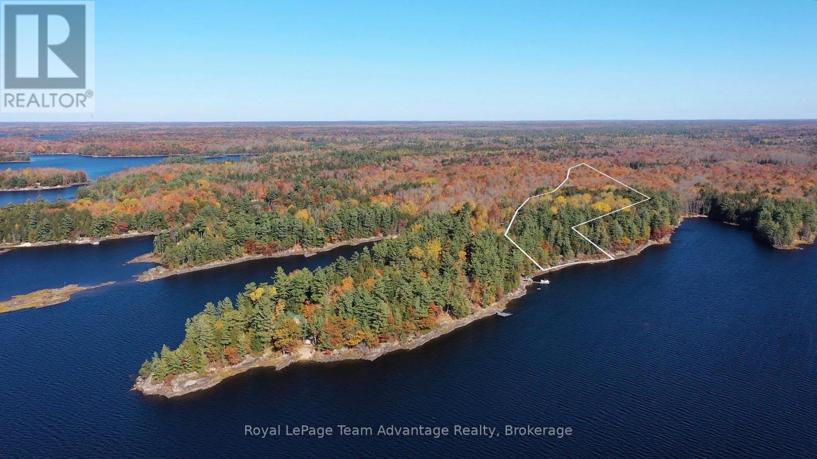 81 Amorak Trail, Whitestone, Ontario  P0A 1G0 - Photo 2 - X12122151