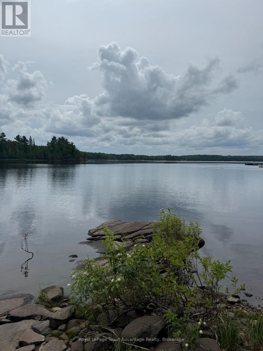 81 Amorak Trail, Whitestone, Ontario  P0A 1G0 - Photo 23 - X12122151