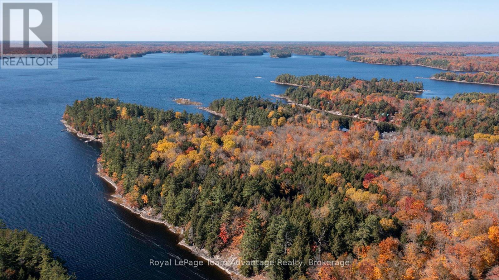 81 Amorak Trail, Whitestone, Ontario  P0A 1G0 - Photo 5 - X12122151