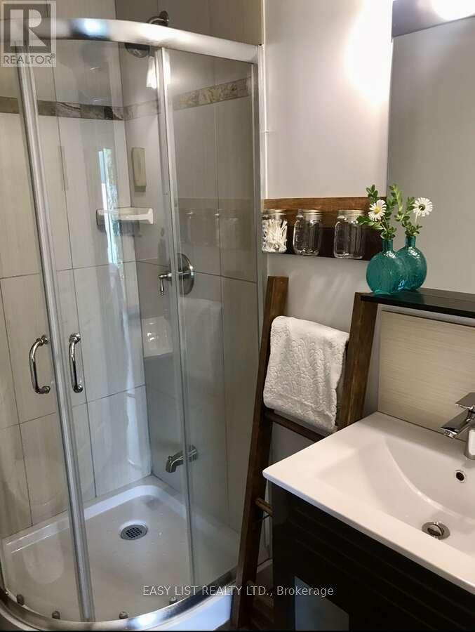 61 Maple Drive, Perry, Ontario  P0A 1J0 - Photo 12 - X12122189