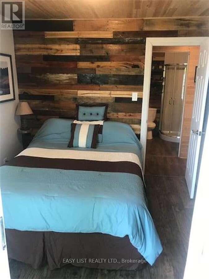 61 Maple Drive, Perry, Ontario  P0A 1J0 - Photo 14 - X12122189