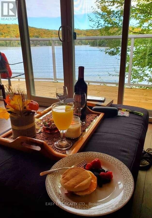 61 Maple Drive, Perry, Ontario  P0A 1J0 - Photo 16 - X12122189