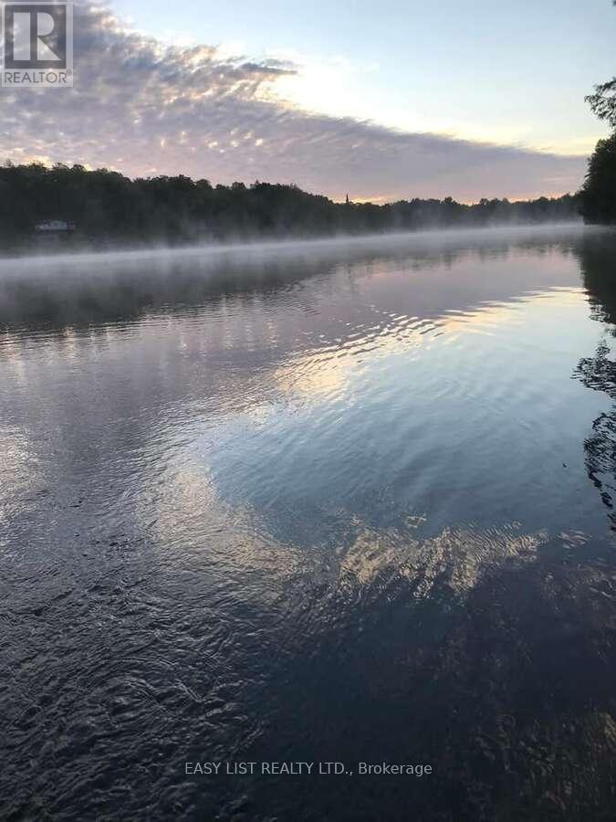 61 Maple Drive, Perry, Ontario  P0A 1J0 - Photo 44 - X12122189