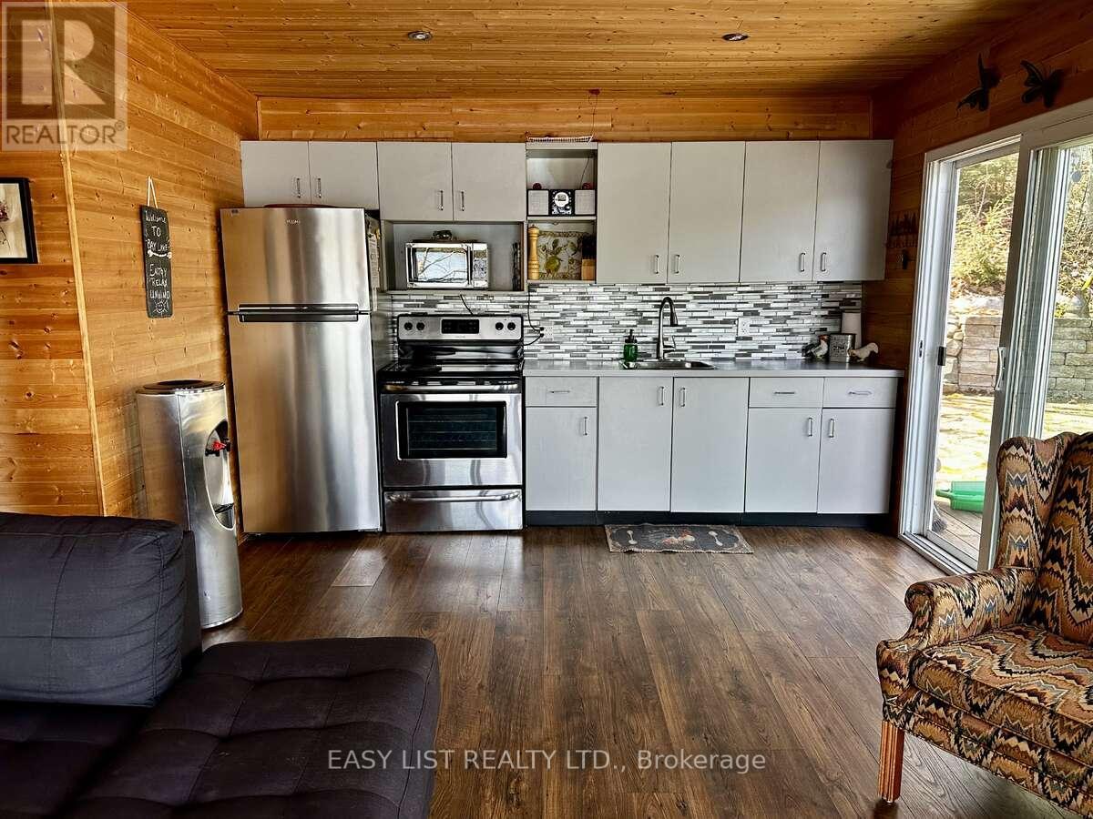 61 Maple Drive, Perry, Ontario  P0A 1J0 - Photo 7 - X12122189