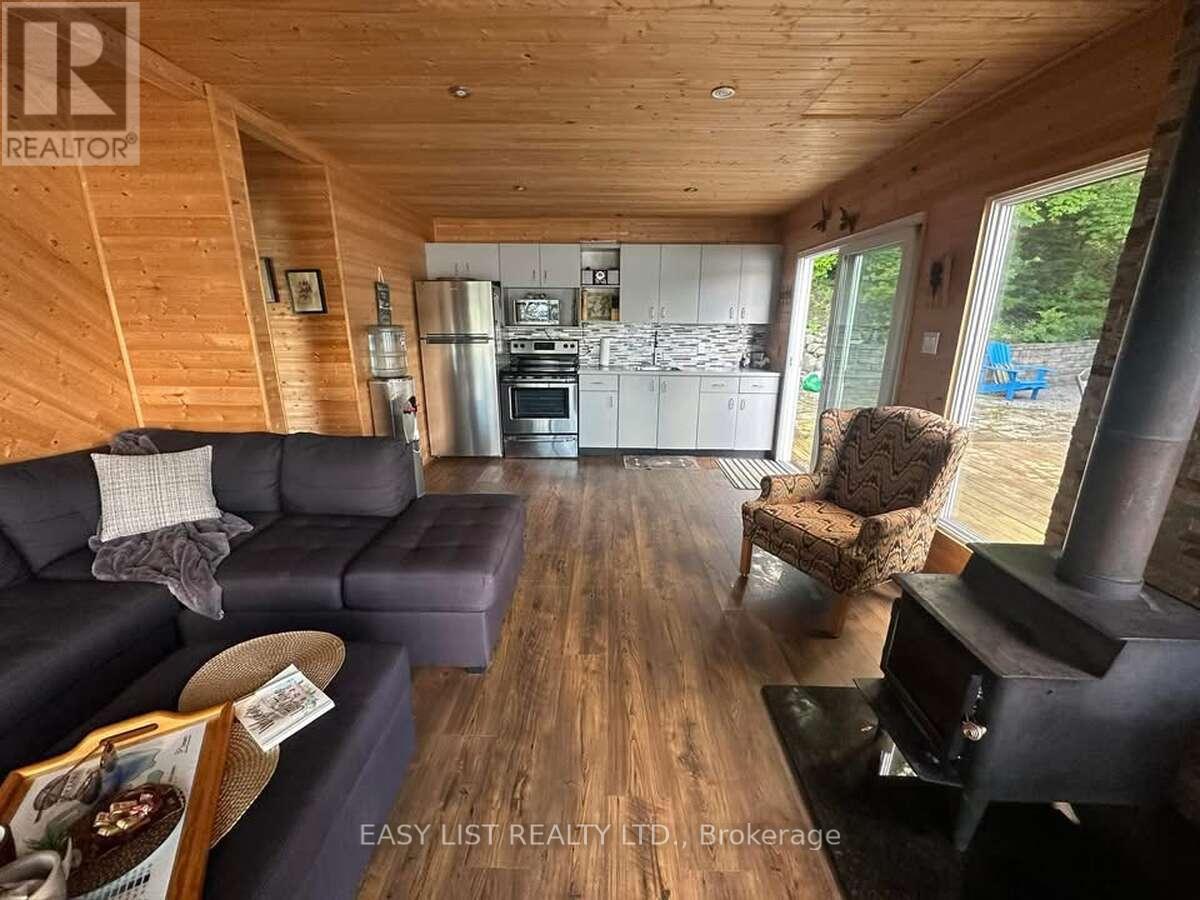 61 Maple Drive, Perry, Ontario  P0A 1J0 - Photo 8 - X12122189