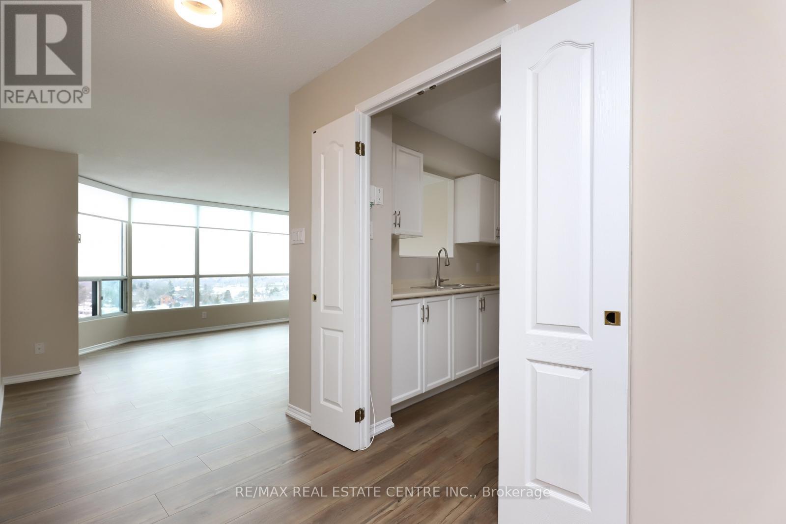 1201 - 100 Millside Drive, Milton, Ontario  L9T 5E2 - Photo 7 - W12122344
