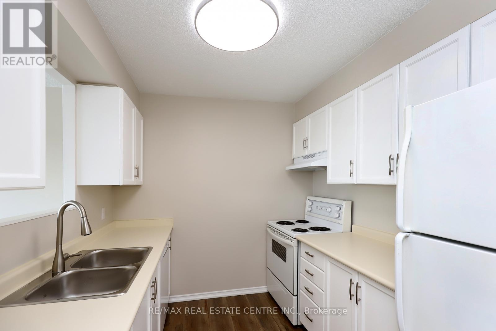 1201 - 100 Millside Drive, Milton, Ontario  L9T 5E2 - Photo 9 - W12122344