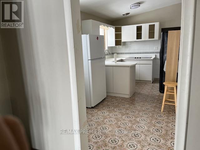 1 Brady Crescent, Toronto, Ontario  M3L 2B6 - Photo 2 - W12122354