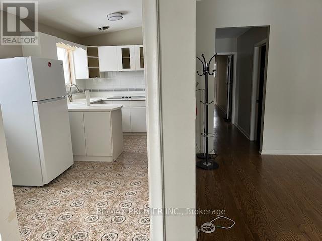 1 Brady Crescent, Toronto, Ontario  M3L 2B6 - Photo 3 - W12122354
