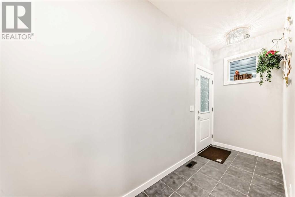 657 Corner Meadows Way Ne, Calgary, Alberta  T3N 2C5 - Photo 4 - A2216956