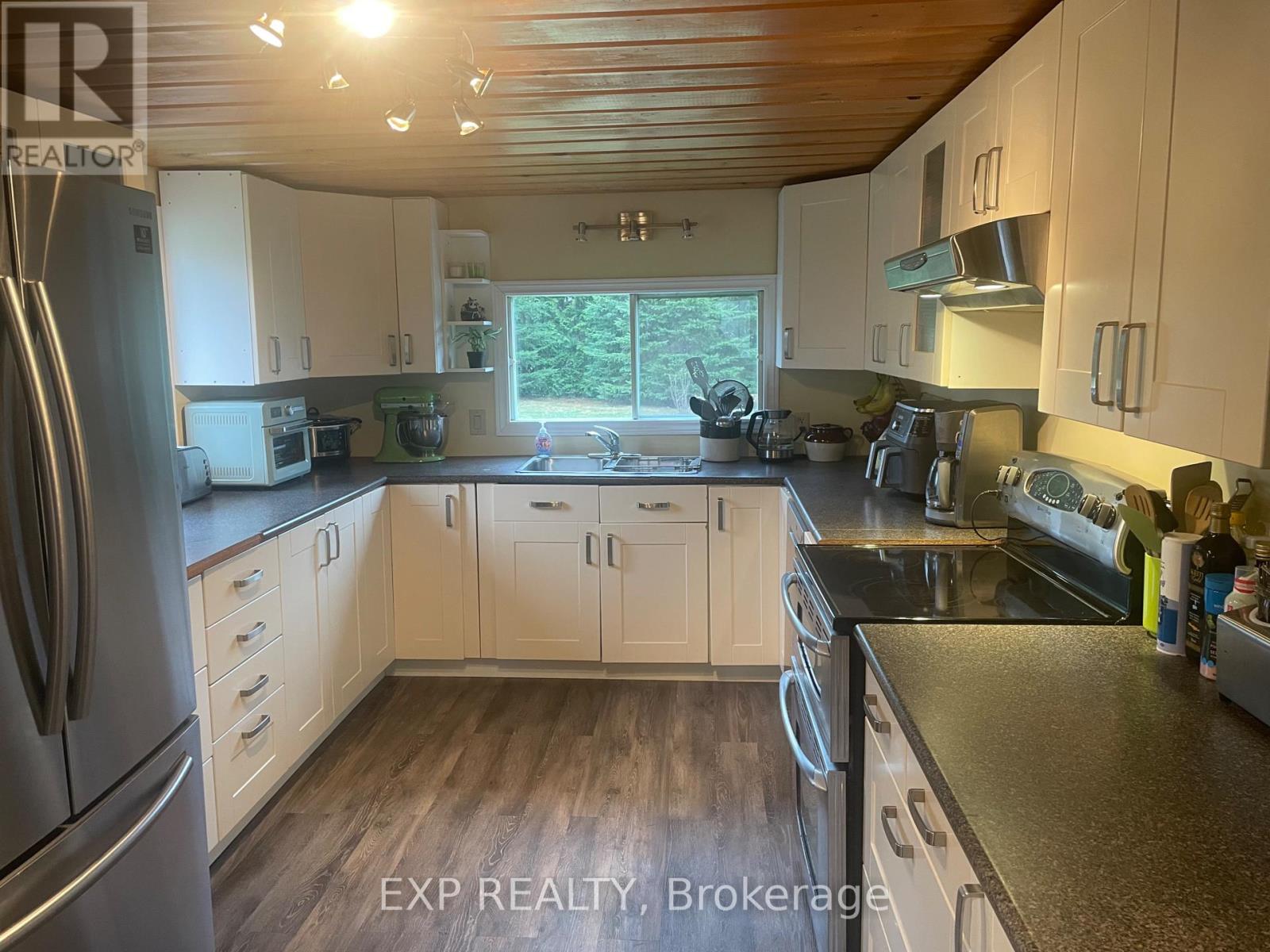 239 East Lake Road, Hastings Highlands, Ontario  K0L 2S0 - Photo 3 - X12122602