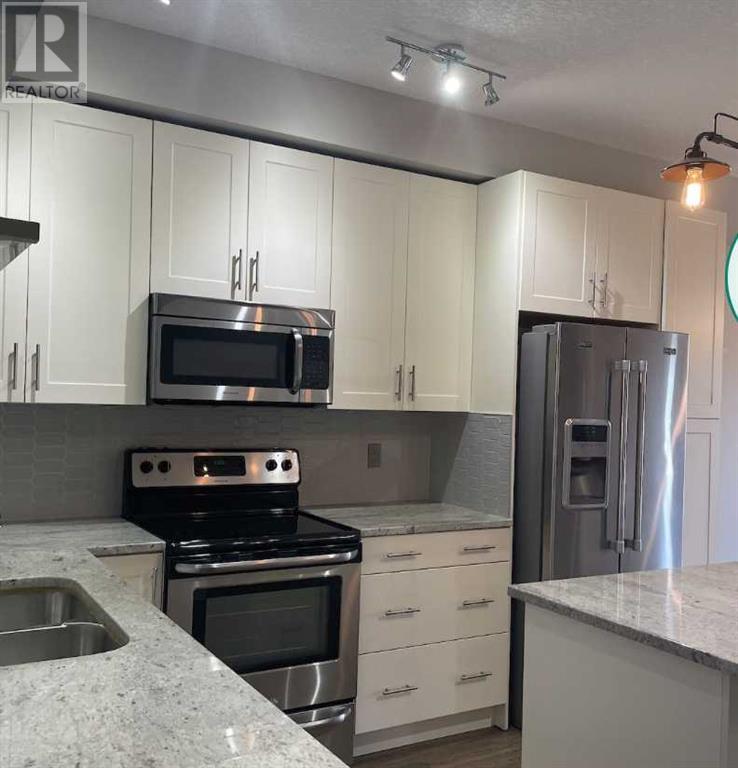 Property at 4408, 755 Copperpond Boulevard SE image 1