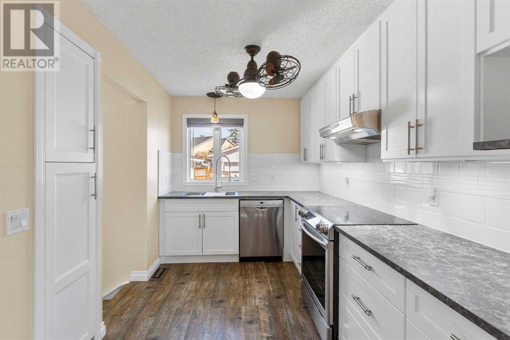 1112 Meadowbrook Drive, Airdrie, Alberta  T4A 1W9 - Photo 24 - A2216395