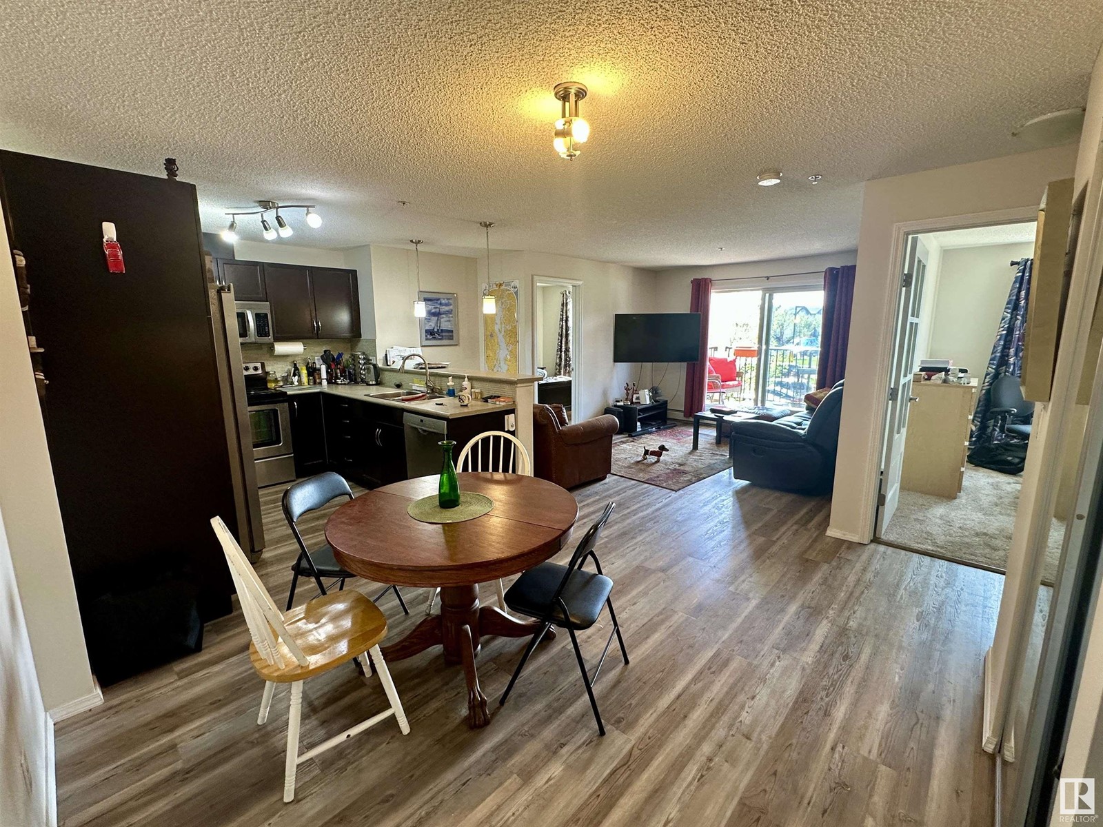 Property at #209 6070 SCHONSEE WY NW image 2