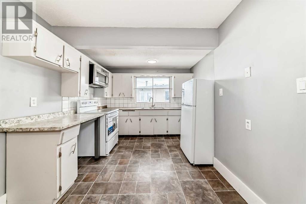Property at 201 Penbrooke Close SE image 4