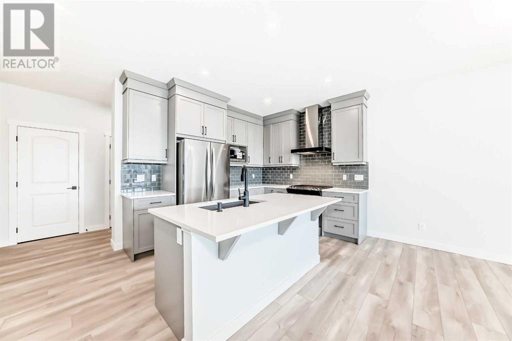 100 Wolf Hollow Villas Se, Calgary, Alberta  T2X 4M6 - Photo 2 - A2203369