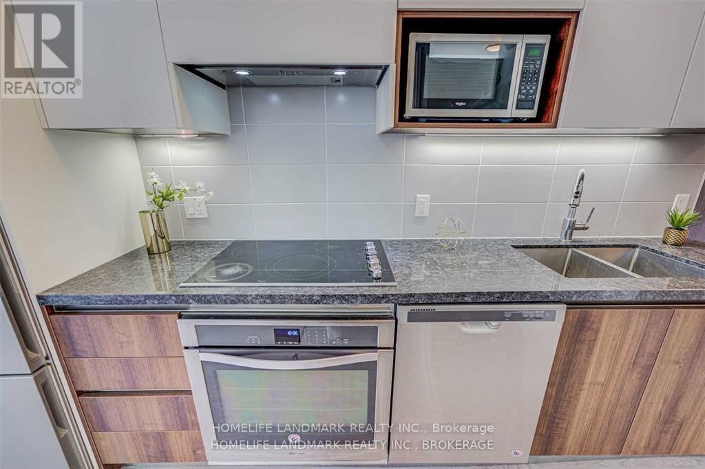 202 - 15 Water Walk Drive, Markham, Ontario  L3P 1N3 - Photo 9 - N12123259