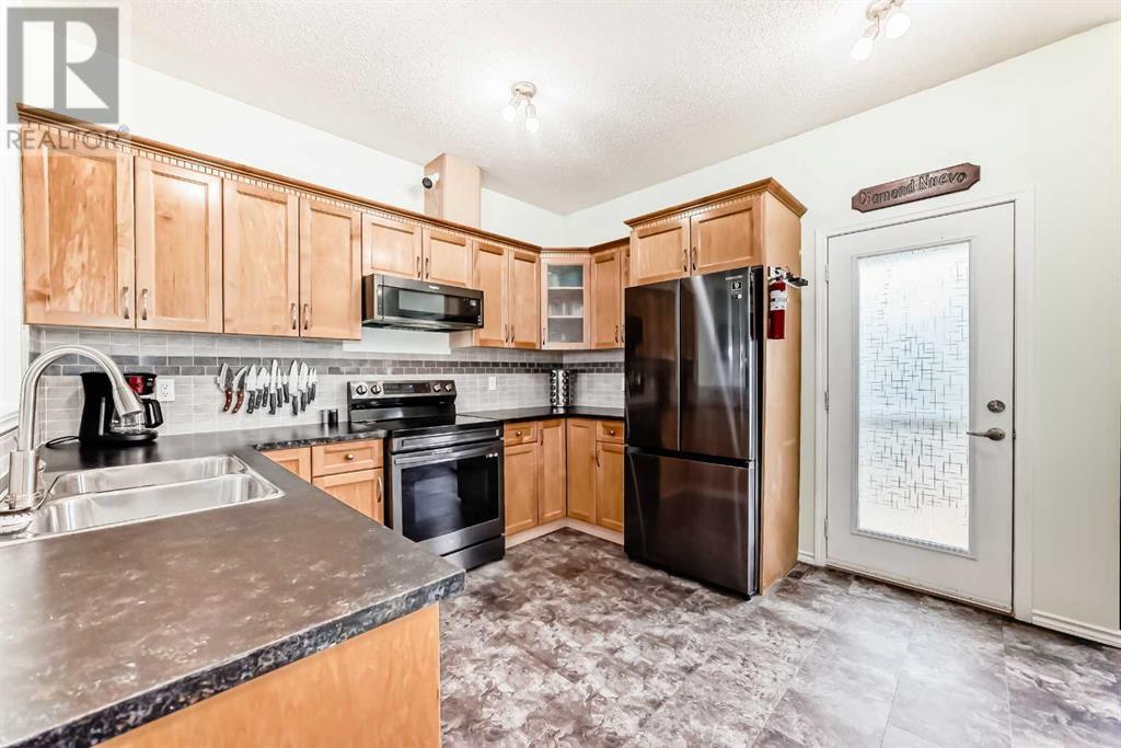 609 Strathaven Mews, Strathmore, Alberta  T1P 1P5 - Photo 9 - A2217696