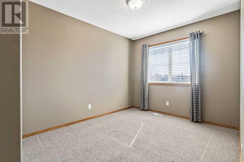 61 Cimarron, Okotoks, Alberta  T1S 2E6 - Photo 29 - A2216194