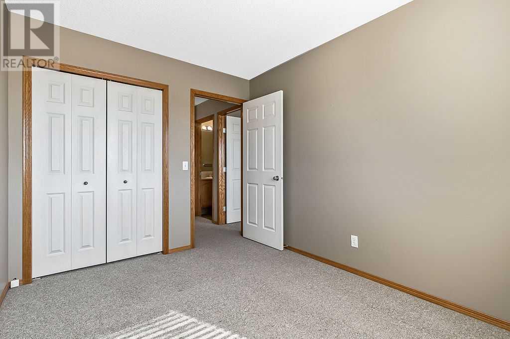 61 Cimarron, Okotoks, Alberta  T1S 2E6 - Photo 32 - A2216194