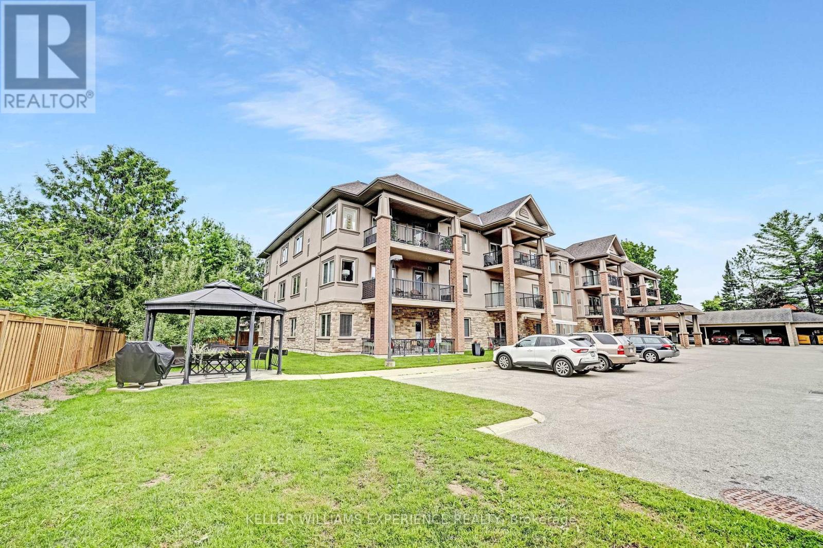 103 - 19b Yonge Street N, Springwater, Ontario  L0L 1P0 - Photo 2 - S12124085