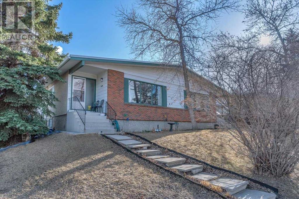 7321 & 7323 Huntertown Crescent Nw, Calgary, Alberta  T2K 4K3 - Photo 3 - A2208983