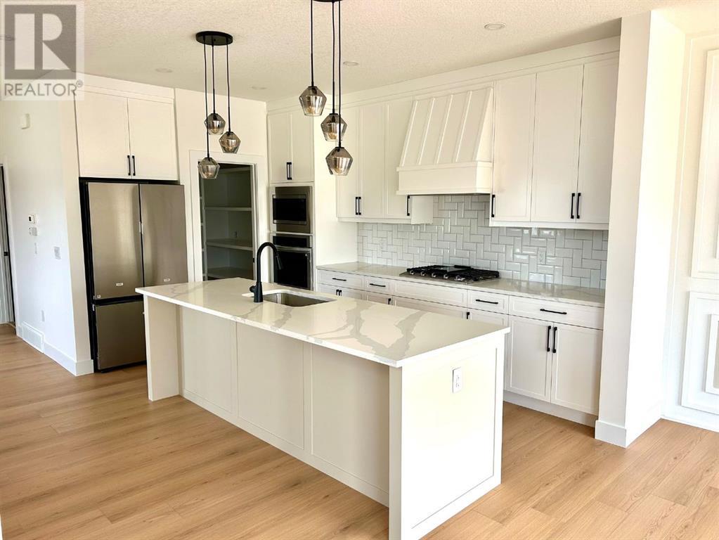 709 Mandalay Avenue, Carstairs, Alberta  T0M 0N0 - Photo 5 - A2211403