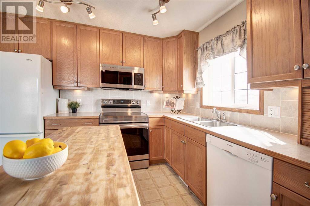 612 Stonegate Road Nw, Airdrie, Alberta  T4B 3A2 - Photo 21 - A2216054