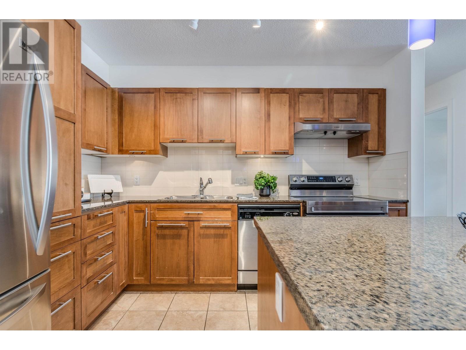 423 19677 Meadow Gardens Way, Pitt Meadows, British Columbia  V3Y 0A2 - Photo 7 - R2992558