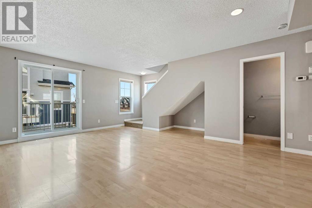 3222 New Brighton Gardens Se, Calgary, Alberta  T2Z 0A7 - Photo 4 - A2217759