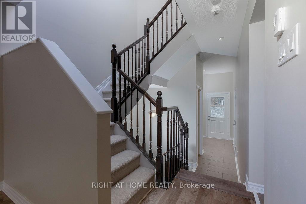 213 Halyard Way, Ottawa, Ontario  K2T 0L2 - Photo 3 - X12125418