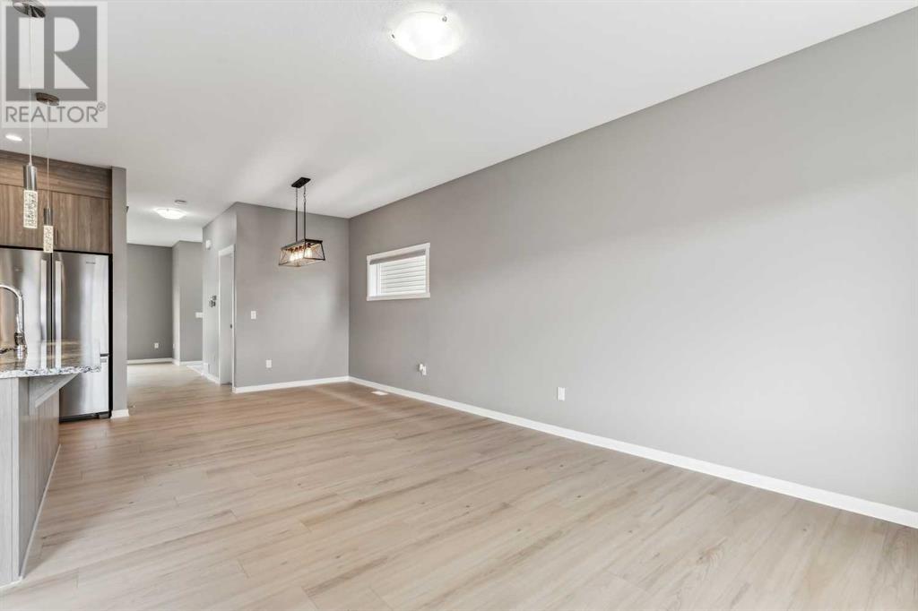 48 Reunion Loop Nw, Airdrie, Alberta  T4B 4J6 - Photo 19 - A2216332