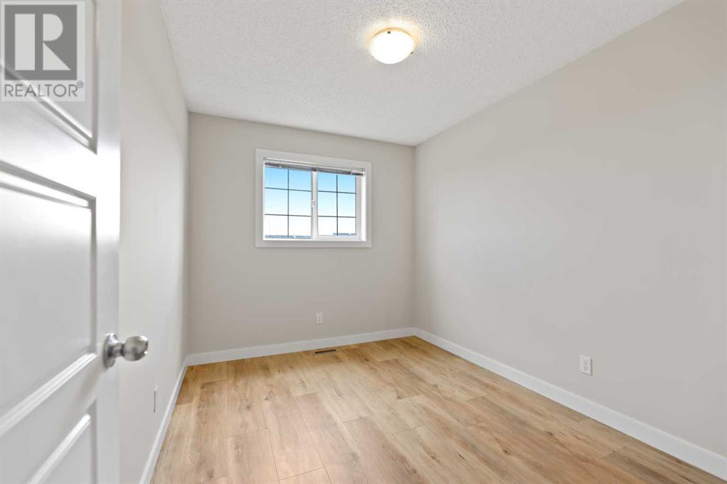 153 Pantego Lane Nw, Calgary, Alberta  T3K 0T1 - Photo 13 - A2217721