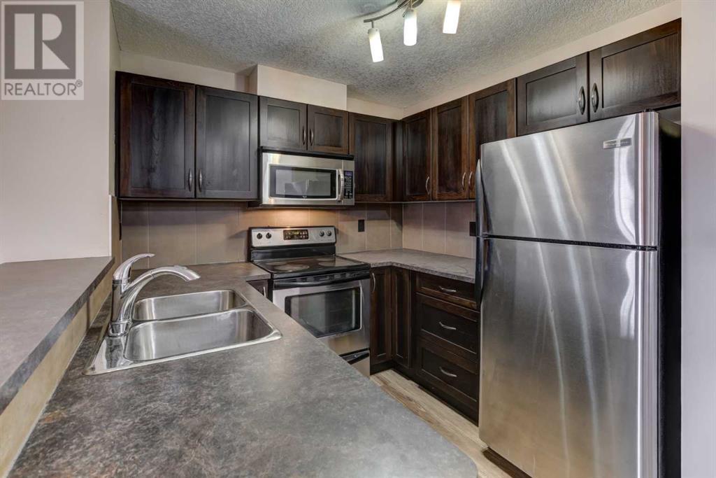 Property at 206, 6315 Ranchview Drive NW image 4
