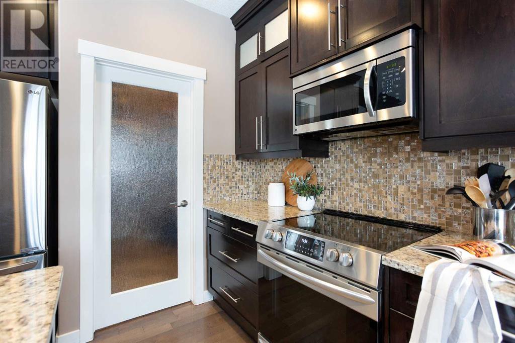 581 Luxstone Landing Sw, Airdrie, Alberta  T4B 0C7 - Photo 7 - A2211985